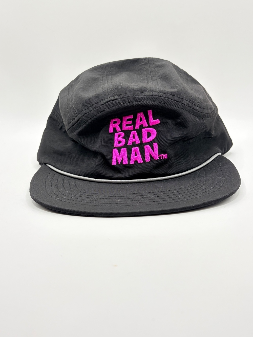 Real Bad Man cap with an adjustable back strap for a customizable fit